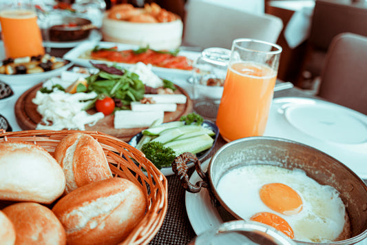 South African breakfast with fried eggs, bread and juice